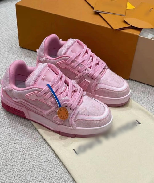 Pink distressed trainers